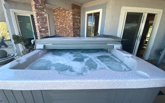 The bubbling hot tub on the patio